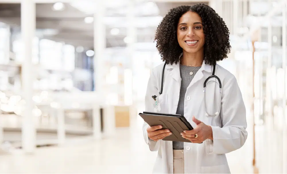 Workflow automation image - smiling doctor with tablet LINK 2