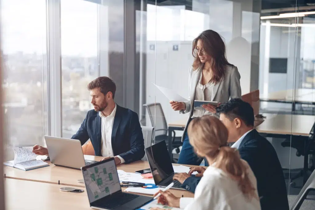 business meeting review with laptops